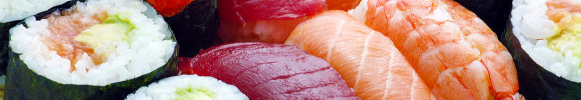 Eating Japanese Sushi at Yama Sushi & Sake Bar restaurant in Portland, OR.